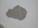 Photo of scratch coat of plaster on church ceiling repair
