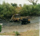 Photo of clearing presmer pond, 1996