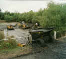 Photo of dumper leaving Presmere Pond, 1996